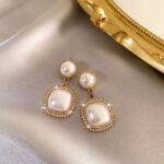 Silver Needle Earrings with White Pearls - Image 4