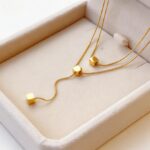 Long Wire Gold Necklace with Three Squares