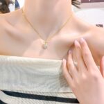 Rotating Rabbit Necklace with Zirconia and Diamonds - Image 2